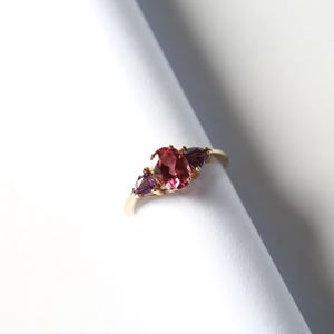 Oval Ruby Engagement Ring: Gold Bridal Ring with Amethyst Accent