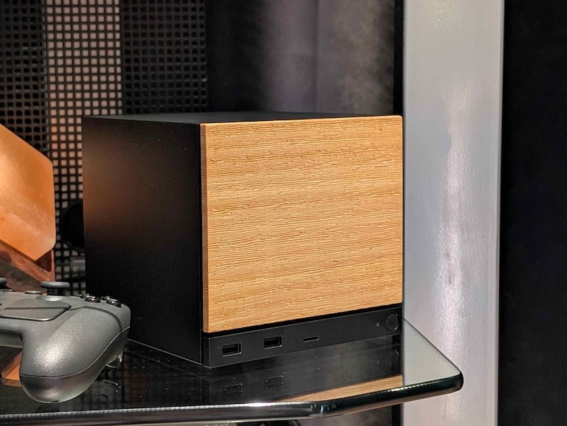 A solid wood lati faceplate for the 2026 Steam Machine, made from genuine wood.