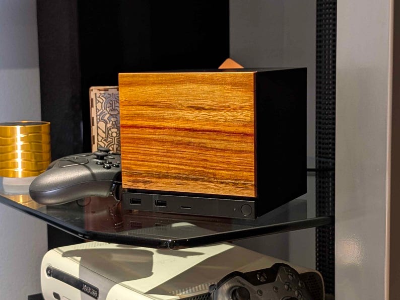 A solid wood canarywood faceplate for the 2026 Steam Machine, made from genuine wood.