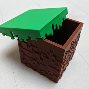 Oferta de 2 por 1 caixa de blocos de grama do Minecraft