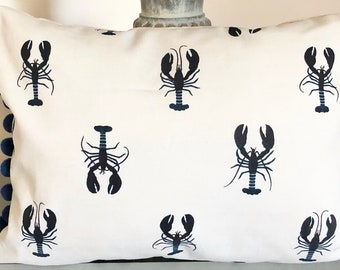 Sophie Allport scorpion design cushion with pom-poms