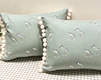 Sophie Allport Coastal Birds design cushion with pom-poms
