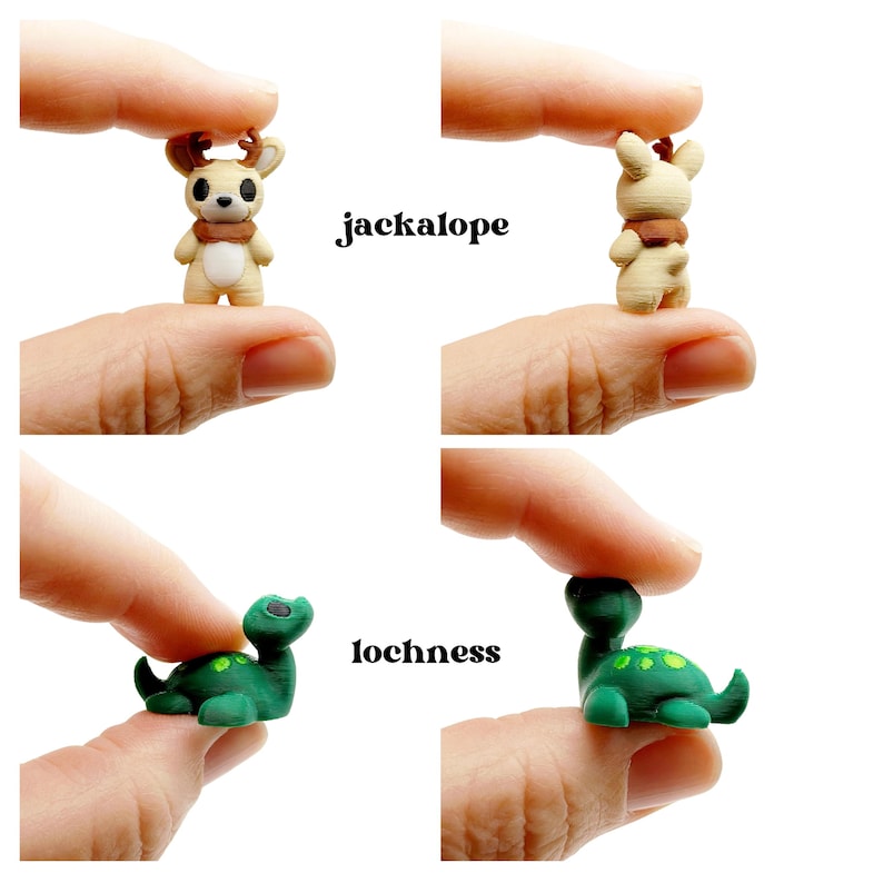 May include: Miniature figurines of a jackalope and a Loch Ness Monster. The jackalope is tan with brown antlers and a scarf. The Loch Ness Monster is green with yellow spots. The word "jackalope" and "lochness" are written in black text.