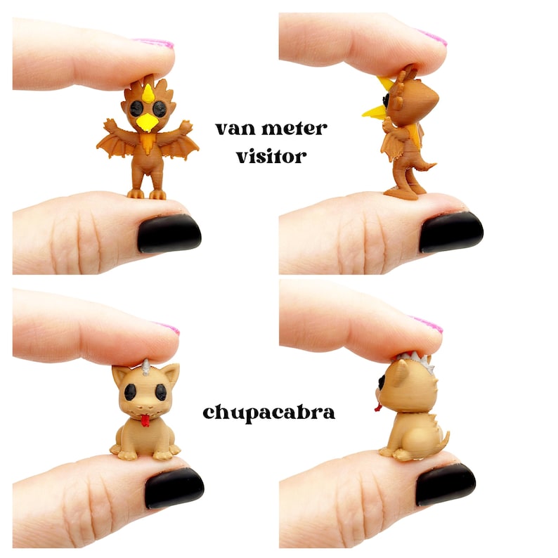 May include: Four miniature figurines of mythical creatures. Two are labeled "van meter visitor" and depict a bird-like creature. The other two are labeled "chupacabra" and show a dog-like creature with horns and a red tongue.