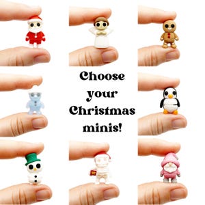 May include: A collection of miniature Christmas figurines, including Santa Claus, an angel, a gingerbread man, a snowman, a penguin, a skeleton, and a gnome. The text "Choose your Christmas minis!" is displayed in the center.
