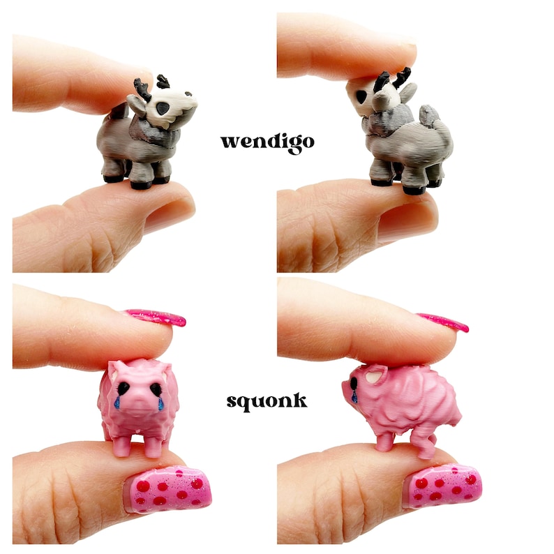 May include: Four miniature figurines are displayed. Two are gray and white creatures labeled "wendigo," and two are pink creatures labeled "squonk." The figurines are held between fingers against a white background. The "squonk" figurines have blue tear drops.