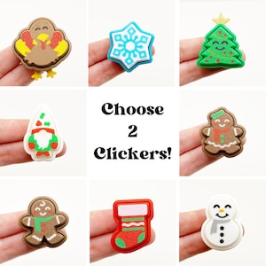 May include: Choose 2 Christmas clicker buttons from a selection of 9 designs: a turkey, snowflake, Christmas tree, gnome, gingerbread person, stocking, snowman, and 2 gingerbread people.