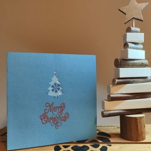 Carte pop-up d’arbre de Noël faite à la main