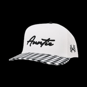 May include: A white baseball cap featuring the word Auntie embroidered in black script on the front panel. The brim displays a black and white gingham check pattern. A small black geometric logo is embroidered on the side of the white crown.