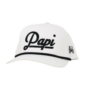 May include: White baseball cap with the word "Papi" in black script across the front. The cap has a black rope detail along the brim and a small black logo on the side.