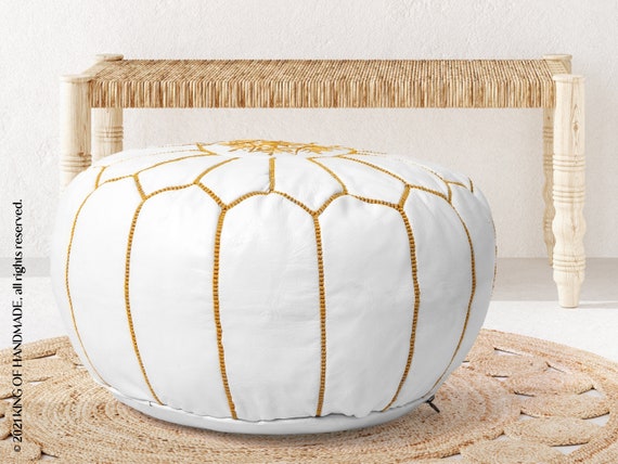 Leather and gold ottoman deals