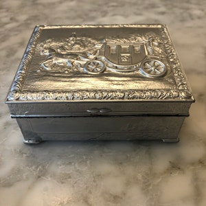 1930&#39;s Tobacco/Cigarette Box  Footed and Stamped Silver Metal  Inside Wood lining  Tobacciana
