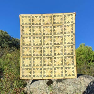 Plant-dyed throw quilt, yellow and green 8-pointed star quilt, hand-quilted and made with upcycled cotton fabric, unique sustainable gift