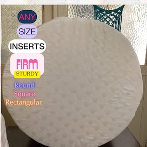 May include: A large, round, white pillow cover with a subtle polka dot pattern. The image includes text that reads "ANY SIZE INSERTS FIRM STURDY Round Square Rectangular."
