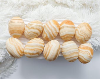 Tú eliges la piedra de palma de calcita naranja