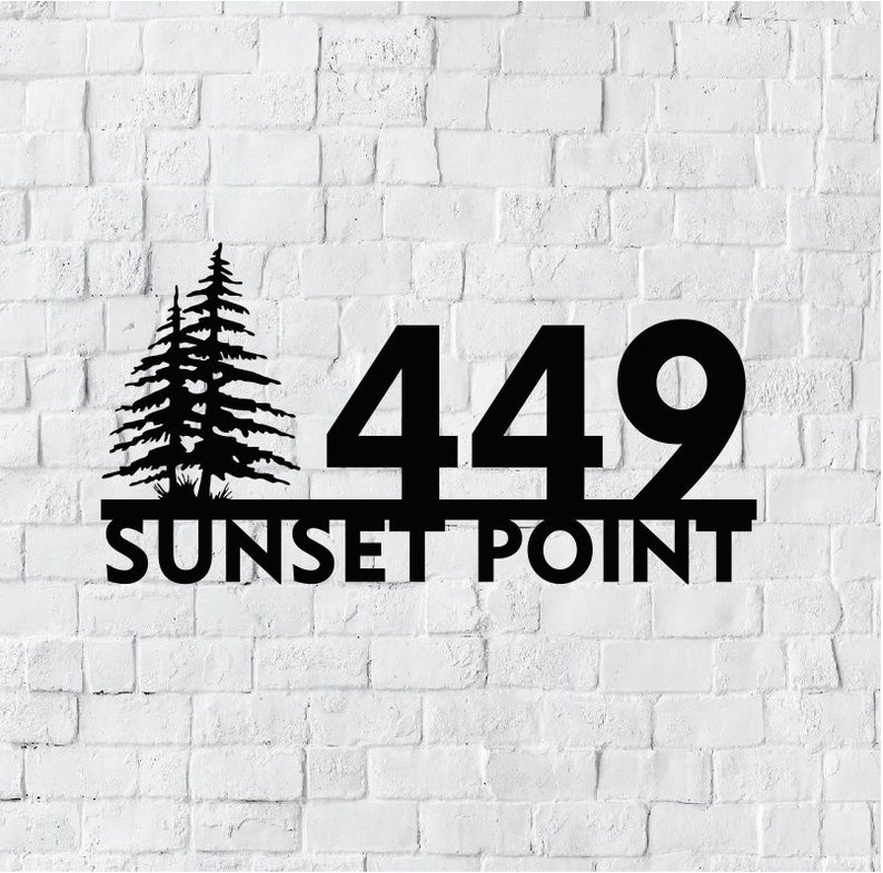 May include: Black metal house number sign with the number 449 and the words "SUNSET POINT" below. The sign features a silhouette of two pine trees.
