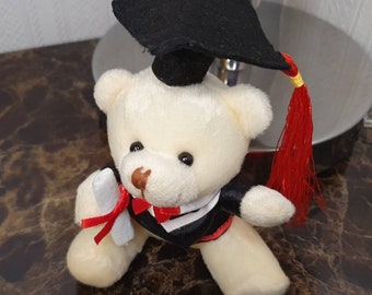 Graduation 7” White Tatty Teddy Bear with Diploma and Yellow Ribbon and Blue Hat Graduation 7” White Tatty Teddy Bear with Diploma and Yellow Ribbon and Blue Hat
