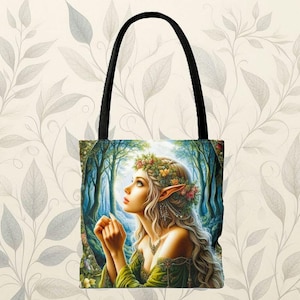 May include: A tote bag with a colorful illustration of a woman with long blonde hair wearing a floral crown and a green dress. The woman is surrounded by trees and flowers.