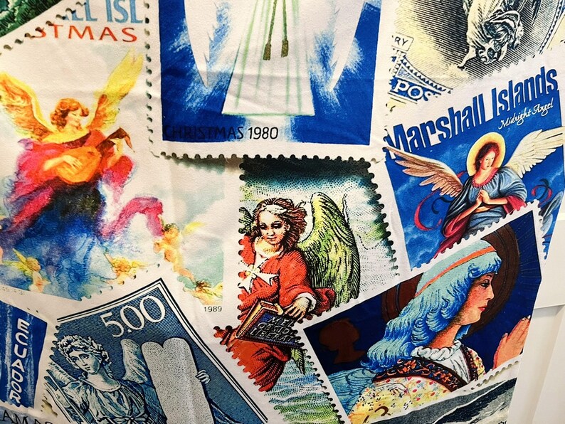 May include: A selection of vibrant postage stamps with angel imagery. The stamps display diverse designs, including angels playing instruments, holding books, and in prayer. Some stamps feature text such as "Christmas 1980" and "Marshall Islands".