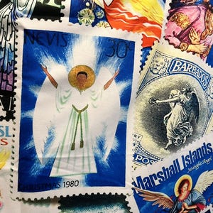 May include: Fabric with a collage of postage stamp designs. Stamps depict angels, including one from "Nevis" in white robes, another from "Barbados", and "Marshall Islands" with "Midnight Angel" text. The stamps are set against a white background.