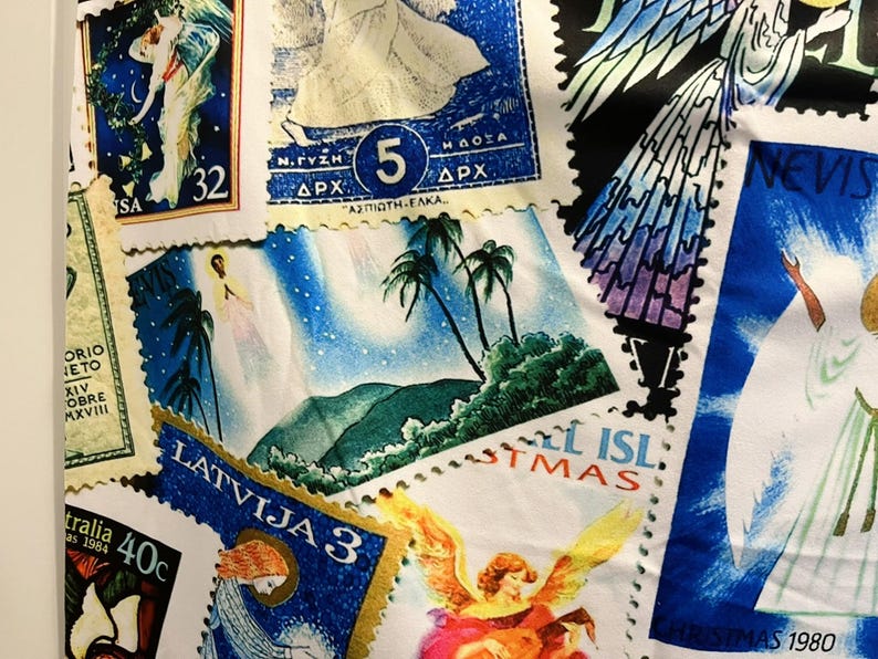 May include: Fabric detail with a collage of postage stamp designs. Stamps showcase angels, tropical scenes, and landscapes in blue, green, and orange hues. Text includes "LATVIJA 3" and "CHRISTMAS 1980".