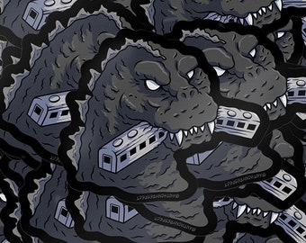 Godzilla Zugbeißer Glänzender laminierter Vinyl-Aufkleber von AntonyRefect