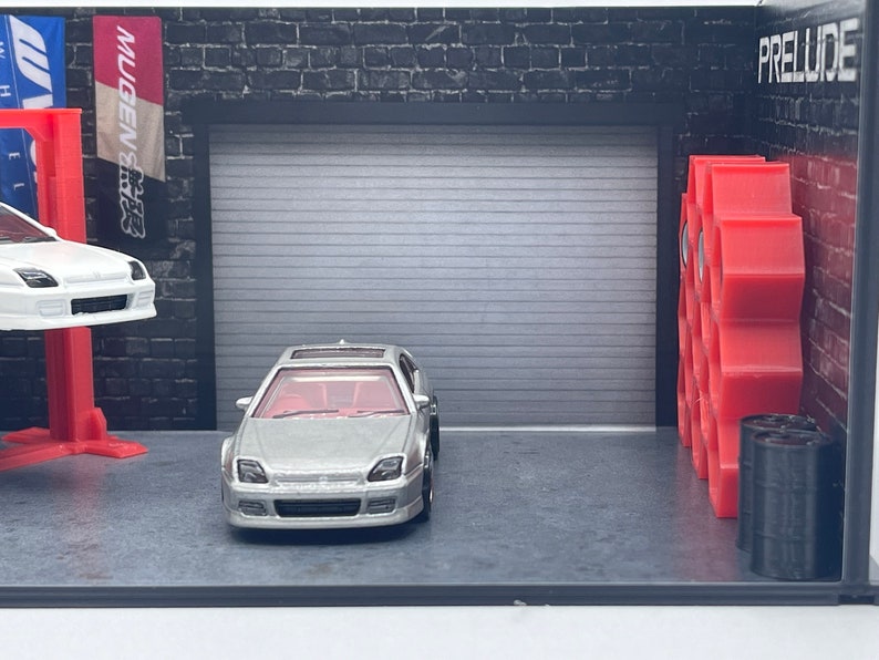 Diorama moulé sous pression pour garage Nissan GT-R Nismo à l'échelle 1/64