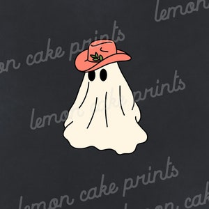 May include: A white ghost wearing a pink cowboy hat with a green leaf design. The ghost has two black eyes and is on a dark gray background.