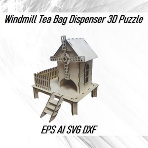 May include: A wooden 3D puzzle of a windmill tea bag dispenser. The puzzle is made of laser-cut wood and is ready to be assembled. The windmill has a small opening for tea bags and a small door on the side. The puzzle is labeled "EPS AI SVG DXF".