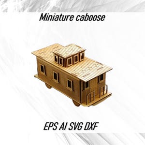 May include: A wooden model of a miniature caboose, a small train car, with a brown wood finish. The caboose has windows and a roof with a slight overhang. The text "EPS AI SVG DXF" is printed below the caboose.