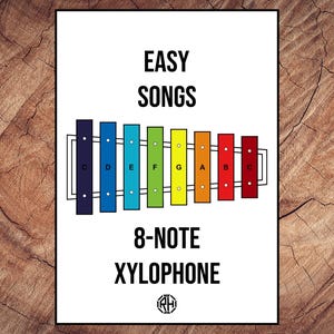 May include: A colorful 8-note xylophone with the notes C, D, E, F, G, A, B, and C labeled on each key. The text "EASY SONGS" and "8-NOTE XYLOPHONE" is printed on the white background.
