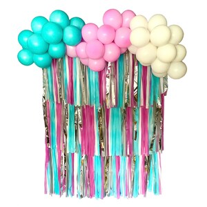 Plastic tablecloth fringe backdrop
