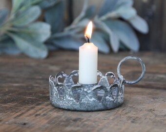 chamberstick candle holder with candle