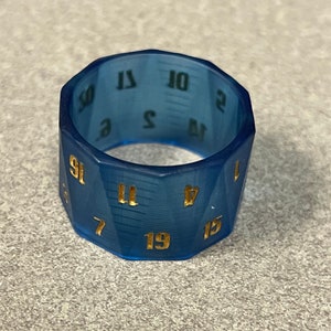 Blue Rollable D20 Twenty Sided Dice Ring With Gold Numbers