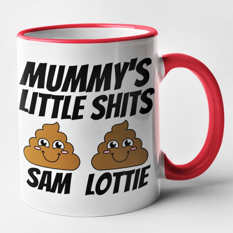 May include: White ceramic mug with a red rim and handle. The mug has a black graphic that says "Mummy's Little Shits" with two cartoon poop emojis with smiling faces. The text "Sam" and "Lottie" are below the emojis.