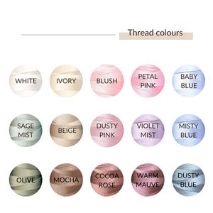 May include: A colour chart titled Thread colours displaying fifteen circular swatches of thread in various shades including white, ivory, blush, petal pink, baby blue, sage mist, beige, dusty pink, violet mist, misty blue, olive, mocha, cocoa rose, warm mauve, and dusty blue.