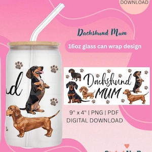 May include: A glass can with a wooden lid and a clear straw, featuring a dachshund design. The design includes the text "Dachshund Mum" and paw prints. The digital download is 9" x 4".