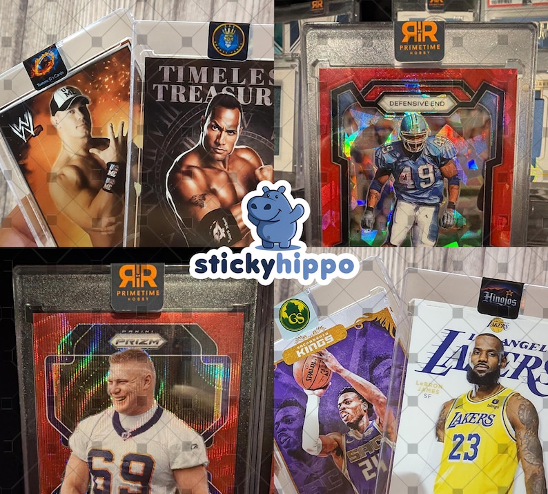 May include: A selection of encased sports and entertainment trading cards. The cards feature athletes and entertainers, including a wrestler, a football player, and a basketball player. The cards are in protective cases with labels.