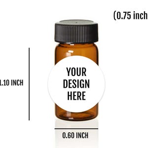 May include: Amber glass bottle with a black cap, featuring a white label that reads "YOUR DESIGN HERE." The bottle is 2.79 cm tall, 1.52 cm wide, and the cap is 1.91 cm. Suitable for essential oils or small product samples.
