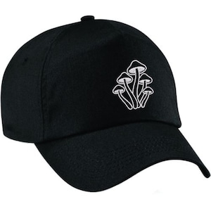 May include: A black baseball cap with a white embroidered design of mushrooms.
