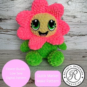 May include: A crochet pattern for a flower-shaped plush toy with a pink flower head, green body, and a happy face. The pattern is called "Flower Buddy Low Sew Digital Pattern" and is available on the Quick Market website.