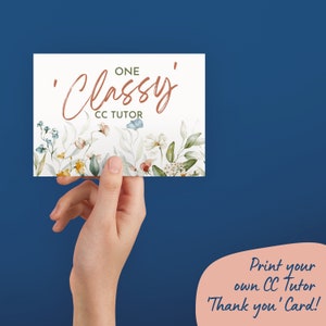 May include: A floral thank you card with the text "One Classy CC Tutor" in brown and green. The card features watercolor flowers and foliage along the bottom edge. The card is held against a dark blue background.