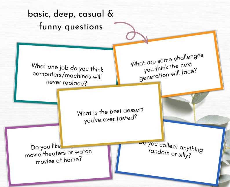 May include: Five colorful cards with conversation starter questions printed on them. The questions are: "What one job do you think computers/machines will never replace?", "What are some challenges you think the next generation will face?", "What is the best dessert you've ever tasted?", "Do you like movie theaters or watch movies at home?", and "Do you collect anything random or silly?"