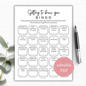 May include: A white printable "Getting to Know You Bingo" game sheet with black text and a black pen. The game includes various prompts to find people with matching characteristics. A pink "editable PDF" sticker is on the bottom right.