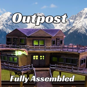 May include: A wooden model of a two-story house with a porch and a balcony. The house is painted brown and has a purple roof. The house is set against a backdrop of snow-capped mountains. The text "Outpost" is written in white letters above the house. The text "Fully Assembled" is written in white letters below the house.