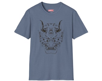 May include: A blue t-shirt with a black and white illustration of a Japanese Oni mask. The mask has a third eye and horns. The text "FANSY" is printed on the shirt.