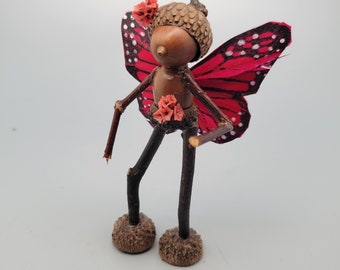 Oakie acorn, butterfly fairy, fantasy art sculpture.