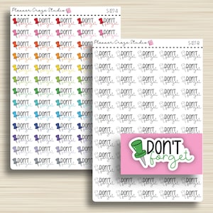May include: Two sticker sheets with the text "DON'T forget" and pushpin graphics in various colors. One sheet is labeled S-127-A and the other S-127-B. A small pink sticker with a green pushpin is also included.