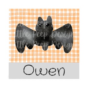May include: A black bat with white eyes on an orange and white gingham background. The name Owen is written in black on a grey rectangle at the bottom of the image.