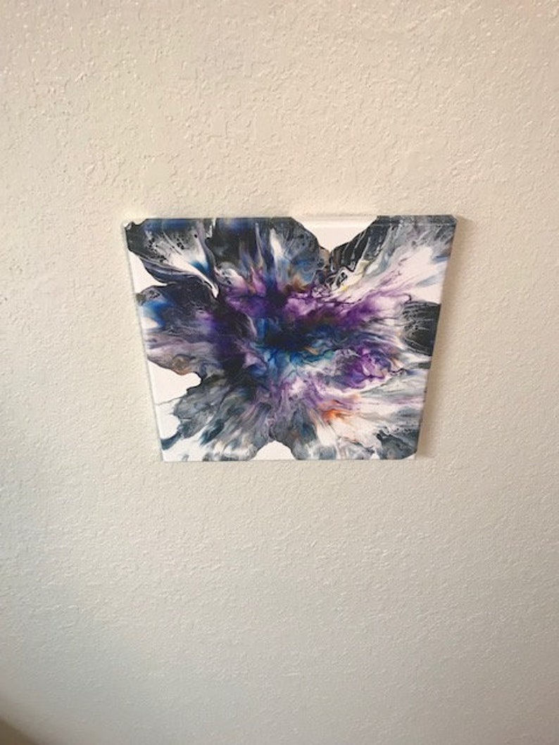 May include: Abstract painting on canvas with swirling colors of purple, blue, white, and black.